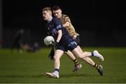 2 March 2023; Eoghan Byrne of SETU Carlow in action against Adam Kelly of TUS Midlands during the Electric Ireland Higher Education GAA Freshers Football 2 Final match between South East Technological University Carlow and Technological University of the Shannon: Midlands at South East Technological University Sports Complex in Carlow. Photo by Stephen McCarthy/Sportsfile