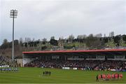 4 March 2023; The Derry and Dublin teams stand for the National Anthem before the Allianz Football League Division 2 match between Derry and Dublin at Celtic Park in Derry. Photo by Ramsey Cardy/Sportsfile