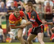 12 June 2004; Sean Kavanagh, Carlow, in action against Brendan Coulter, Down. Bank of Ireland Football Championship Qualifier, Round 1, Carlow v Down, Dr. Cullen Park, Carlow. Picture credit; Damien Eagers / SPORTSFILE