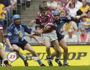 13 June 2004; Ronan Whelan, Westmeath, in action against Dublin's Cormac O'Brien, left, and Aodhan de Paor. Guinness Leinster Senior Hurling Championship Quarter-Final, Dublin v Westmeath, Croke Park, Dublin. Picture credit; Brian Lawless / SPORTSFILE