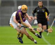 24 August 2013; Rhys Clarke, Wexford, is tackled by Tiernan Coyle, Antrim. Bord Gáis Energy GAA Hurling Under 21 All-Ireland Championship Semi-Final, Wexford v Antrim, Semple Stadium, Thurles, Co. Tipperary. Picture credit: Ray McManus / SPORTSFILE