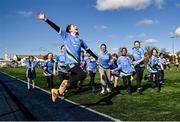 7 March 2023; Victoria Poplawska of Scoil Ide Clondalkin, centre, and team mates during the Leinster Rugby Girls Primary School Mega Blitz at Clontarf FC in Dublin. Photo by David Fitzgerald/Sportsfile