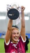 8 March 2023; University of Galway captain Cathy Hogan lifts the cup after her side's victory in the 2023 Yoplait Ladies HEC Lagan Cup Final match between DCU Dóchas Éireann and University of Galway at University of Galway Connacht GAA Air Dome in Bekan, Mayo. Photo by Piaras Ó Mídheach/Sportsfile