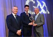 10 March 2023; Seán Kelly of Moycullen is presented with his AIB GAA Football Club Team of The Year award by GAA Vice President John Murphy, right, and AIB CMO Mark Doyle, at the AIB Club Players Awards at Croke Park in Dublin. Photo by Ramsey Cardy/Sportsfile