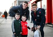 10 March 2023; Adam Murphy, left, and Sam Curtis of St Patrick's Athletic pose for a photograph with young St Patrick's Athletic supporters before the SSE Airtricity Men's Premier Division match between St Patrick's Athletic and Bohemians at Richmond Park in Dublin. Photo by Stephen McCarthy/Sportsfile