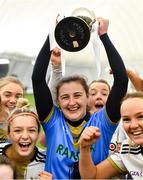 11 March 2023; MTU captain Robyn Whyte lifts the cup after her side's victory in the 2023 Yoplait Ladies HEC Giles Cup Final match between University of Ulster and MTU Kerry at University of Galway Connacht GAA Air Dome in Bekan, Mayo. Photo by Piaras Ó Mídheach/Sportsfile