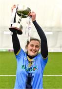 11 March 2023; MTU captain Robyn Whyte lifts the cup after her side's victory in the 2023 Yoplait Ladies HEC Giles Cup Final match between University of Ulster and MTU Kerry at University of Galway Connacht GAA Air Dome in Bekan, Mayo. Photo by Piaras Ó Mídheach/Sportsfile