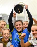 11 March 2023; University of Ulster captain Maeve Deery lifts the cup after her side's victory in the 2023 Yoplait Ladies HEC Giles Cup Final match between University of Ulster and MTU Kerry at University of Galway Connacht GAA Air Dome in Bekan, Mayo. Photo by Piaras Ó Mídheach/Sportsfile