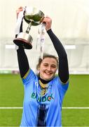 11 March 2023; University of Ulster captain Maeve Deery lifts the cup after her side's victory in the 2023 Yoplait Ladies HEC Giles Cup Final match between University of Ulster and MTU Kerry at University of Galway Connacht GAA Air Dome in Bekan, Mayo. Photo by Piaras Ó Mídheach/Sportsfile