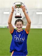 11 March 2023; ATU Donegal captain Julie Treaty lifts the cup after her side's victory in the 2023 Yoplait Ladies HEC Lynch Cup Final match between ATU Donegal and UCC at University of Galway Connacht GAA Air Dome in Bekan, Mayo. Photo by Piaras Ó Mídheach/Sportsfile