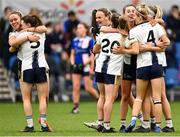 11 March 2023; University of Ulster players celebrate after their side's victory in the 2023 Yoplait Ladies HEC Giles Cup Final match between University of Ulster and MTU Kerry at University of Galway Connacht GAA Air Dome in Bekan, Mayo. Photo by Piaras Ó Mídheach/Sportsfile