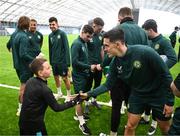 24 March 2023; The Republic of Ireland team granted the wish of 10-year-old Tyler Breen Somers, from Inchicore, Dublin, by welcoming him to training at the National Indoor Arena on the Sport Ireland Campus in Dublin. Tyler pictured with Republic of Ireland's Jamie McGrath, underwent a bone marrow transplant, 3 years ago, and has recovered from acute lymphoblastic leukaemia. His wish was aided by Make-A-Wish Ireland. Photo by Stephen McCarthy/Sportsfile