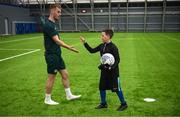 24 March 2023; The Republic of Ireland team granted the wish of 10-year-old Tyler Breen Somers, from Inchicore, Dublin, by welcoming him to training at the National Indoor Arena on the Sport Ireland Campus in Dublin. Tyler pictured with Republic of Ireland's Mark Sykes, underwent a bone marrow transplant, 3 years ago, and has recovered from acute lymphoblastic leukaemia. His wish was aided by Make-A-Wish Ireland. Photo by Stephen McCarthy/Sportsfile