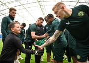24 March 2023; The Republic of Ireland team granted the wish of 10-year-old Tyler Breen Somers, from Inchicore, Dublin, by welcoming him to training at the National Indoor Arena on the Sport Ireland Campus in Dublin. Tyler pictured with Republic of Ireland's James McClean, underwent a bone marrow transplant, 3 years ago, and has recovered from acute lymphoblastic leukaemia. His wish was aided by Make-A-Wish Ireland. Photo by Stephen McCarthy/Sportsfile
