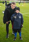 24 March 2023; The Republic of Ireland team granted the wish of 10-year-old Tyler Breen Somers, from Inchicore, Dublin, by welcoming him to training at the National Indoor Arena on the FAI National Training Centre in Abbotstown, Dublin. Tyler pictured with Republic of Ireland's Seamus Coleman, underwent a bone marrow transplant, 3 years ago, and has recovered from acute lymphoblastic leukaemia. His wish was aided by Make-A-Wish Ireland. Photo by Stephen McCarthy/Sportsfile