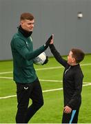 24 March 2023; The Republic of Ireland team granted the wish of 10-year-old Tyler Breen Somers, from Inchicore, Dublin, by welcoming him to training at the National Indoor Arena on the Sport Ireland Campus in Dublin. Tyler pictured with Republic of Ireland's Evan Ferguson, underwent a bone marrow transplant, 3 years ago, and has recovered from acute lymphoblastic leukaemia. His wish was aided by Make-A-Wish Ireland. Photo by Stephen McCarthy/Sportsfile