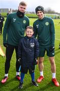 24 March 2023; The Republic of Ireland team granted the wish of 10-year-old Tyler Breen Somers, from Inchicore, Dublin, by welcoming him to training at the National Indoor Arena on the FAI National Training Centre in Abbotstown, Dublin. Tyler pictured with Republic of Ireland's Evan Ferguson, left, and Jayson Molumby, underwent a bone marrow transplant, 3 years ago, and has recovered from acute lymphoblastic leukaemia. His wish was aided by Make-A-Wish Ireland. Photo by Stephen McCarthy/Sportsfile