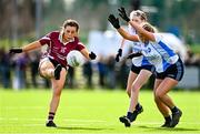 25 March 2023; Orla McAlinden of St Ronan's College in action against Grace Munro, right, and Aoibheann Birchall of Maynooth during the Lidl LGFA Post Primary Junior B Final match between Maynooth Educate Together, Kildare, and St Ronan's College Lurgan, Armagh, at the GAA National Games Development Centre in Abbotstown, Dublin. Photo by Ben McShane/Sportsfile