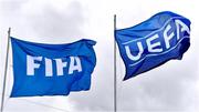 22 March 2023; The FIFA and UEFA flags flying inside the ground before the UEFA European Under-19 Championship Elite Round match between Republic of Ireland and Slovakia at Ferrycarrig Park in Wexford. Photo by Piaras Ó Mídheach/Sportsfile