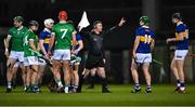 25 March 2023; Linesman James Owens orders players away from midfield before the throw-in to start the Allianz Hurling League Division 1 Semi-Final match between Limerick and Tipperary at TUS Gaelic Grounds in Limerick. Photo by Piaras Ó Mídheach/Sportsfile