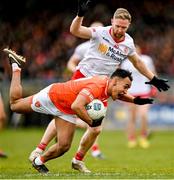 26 March 2023; Jemar Hall of Armagh in action against Frank Burns of Tyrone during the Allianz Football League Division 1 match between Tyrone and Armagh at O'Neill's Healy Park in Omagh, Tyrone. Photo by Ramsey Cardy/Sportsfile