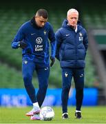 26 March 2023; Kylian Mbappé and manager Didier Deschamps during a France training sesson at Aviva Stadium in Dublin. Photo by Stephen McCarthy/Sportsfile