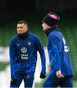 26 March 2023; Kylian Mbappé, left, and Antoine Griezmann during a France training sesson at Aviva Stadium in Dublin. Photo by Stephen McCarthy/Sportsfile