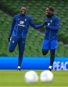 26 March 2023; Ibrahima Konaté and Axel Disasi, right, during a France training sesson at Aviva Stadium in Dublin. Photo by Stephen McCarthy/Sportsfile
