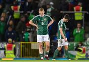 26 March 2023; George Saville of Northern Ireland dejected after his side's defeat in the UEFA EURO 2024 Championship Qualifier match between Northern Ireland and Finland at National Stadium at Windsor Park in Belfast. Photo by Ramsey Cardy/Sportsfile