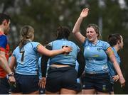 31 March 2023; Eimear Douglas of UCD, centre, celebrates with teammates after scoring her side's first try during the Annual Women's Rugby Colours match between University College Dublin and Dublin University at UCD Bowl in Belfield, Dublin. Photo by Harry Murphy/Sportsfile