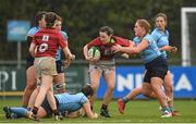 31 March 2023; Jillian O'Toole of DUFC is tackled by Wren Higgins of UCD during the Annual Women's Rugby Colours match between University College Dublin and Dublin University at UCD Bowl in Belfield, Dublin. Photo by Harry Murphy/Sportsfile