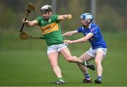 1 April 2023; David McGovern of Leitrim in action against Colin Gargan of Cavan during the Allianz Hurling League Division 3B Final match between Cavan and Leitrim at GAA National Games Development Centre in Sport Ireland Campus in Dublin. Photo by David Fitzgerald/Sportsfile