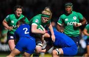 1 April 2023; Sam Monaghan of Ireland is tackled by Agathe Sochat and Audrey Forlani of France during the TikTok Women's Six Nations Rugby Championship match between Ireland and France at Musgrave Park in Cork. Photo by Brendan Moran/Sportsfile