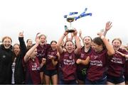 1 April 2023; St Mary’s Naas captain Anna Carpenter lifts the cup alongside her teammates after the Lidl All Ireland Post Primary School Senior ‘C’ Championship Final match between Virginia College, Cavan and St Mary’s Naas, Kildare, at GAA National Games Development Centre in Sport Ireland Campus, Dublin. Photo by Matt Browne/Sportsfile