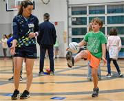 6 April 2023; Lyndsey Davey of Dublin with fourth grade students during a Ladies Football coaching clinic at the Casis Elementary School during the 2023 TG4 LGFA All-Star Tour to Austin in Texas, USA. Photo by Brendan Moran/Sportsfile