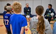 6 April 2023; Monica McGuirk, left, and Emma Troy of Meath with fifth grade students during a Ladies Football coaching clinic at the Casis Elementary School during the 2023 TG4 LGFA All-Star Tour to Austin in Texas, USA. Photo by Brendan Moran/Sportsfile