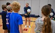 6 April 2023; Monica McGuirk of Meath with fifth grade students during a Ladies Football coaching clinic at the Casis Elementary School during the 2023 TG4 LGFA All-Star Tour to Austin in Texas, USA. Photo by Brendan Moran/Sportsfile