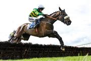 8 April 2023; Canal End, with Mark Walsh up, jumps the last on their way to winning the Tom Quinlan Electrical Maiden Hurdle on day one of the Fairyhouse Easter Festival at Fairyhouse Racecourse in Ratoath, Meath. Photo by Seb Daly/Sportsfile