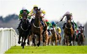 8 April 2023; Risk Belle, left, with Mark Walsh up, collides with Monbeg Park, and jockey Brian Lawless, on their way to winning the RYBO Handicap Hurdle, following a steward's enquiry, on day one of the Fairyhouse Easter Festival at Fairyhouse Racecourse in Ratoath, Meath. Photo by Seb Daly/Sportsfile