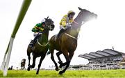 8 April 2023; Risk Belle, left, with Mark Walsh up, on their way to winning the RYBO Handicap Hurdle, from Monbeg Park, with Brian Lawless up, following a steward's enquiry, on day one of the Fairyhouse Easter Festival at Fairyhouse Racecourse in Ratoath, Meath. Photo by Seb Daly/Sportsfile