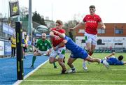 8 April 2023; Tom Bowen of Wales is tackled by Sari Giulio of Italy during the U18 Six Nations Festival match between Wales and Italy at Energia Park in Dublin. Photo by Harry Murphy/Sportsfile