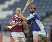 19 June 2004; Eoin Browne, Laois, in action against Enda Loughlin, Westmeath. Guinness All-Ireland Hurling Championship Qualifier, Laois v Westmeath, O'Moore Park, Portlaoise, Co. Laois. Picture credit; Damien Eagers / SPORTSFILE