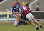 19 June 2004; Michael McEvoy, Laois, in action against Christo Murtagh, Westmeath. Guinness All-Ireland Hurling Championship Qualifier, Laois v Westmeath, O'Moore Park, Portlaoise, Co. Laois. Picture credit; Damien Eagers / SPORTSFILE
