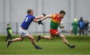 9 April 2023; Ciarán Moran of Carlow in action against Zach Cullen of Wicklow during the Leinster GAA Football Senior Championship Round 1 match between Wicklow and Carlow at Echelon Park in Aughrim, Wicklow. Photo by Daire Brennan/Sportsfile