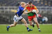 9 April 2023; Colm Hulton of Carlow in action against Mark Kenny of Wicklow during the Leinster GAA Football Senior Championship Round 1 match between Wicklow and Carlow at Echelon Park in Aughrim, Wicklow. Photo by Daire Brennan/Sportsfile