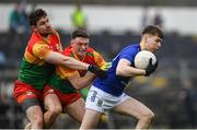 9 April 2023; Gearóid Murphy of Wicklow in action against Ciarán Moran, left, and Seánie Bambrick of Carlow during the Leinster GAA Football Senior Championship Round 1 match between Wicklow and Carlow at Echelon Park in Aughrim, Wicklow. Photo by Daire Brennan/Sportsfile