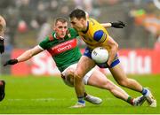 9 April 2023; Conor Hussey of Roscommon in action against Eoghan McLaughlin of Mayo during the Connacht GAA Football Senior Championship Quarter-Final match between Mayo and Roscommon at Hastings Insurance MacHale Park in Castlebar, Mayo. Photo by Ray Ryan/Sportsfile