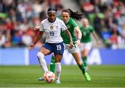 8 April 2023; Crystal Dunn of United States in action against Áine O'Gorman of Republic of Ireland during the women's international friendly match between USA and Republic of Ireland at the Q2 Stadium in Austin, Texas, USA. Photo by Stephen McCarthy/Sportsfile