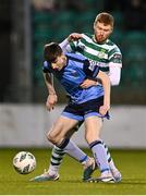 10 April 2023; Jessie Dempsey of UCD in action against Darragh Nugent of Shamrock Rovers during the SSE Airtricity Men's Premier Division match between Shamrock Rovers and UCD at Tallaght Stadium in Dublin. Photo by Piaras Ó Mídheach/Sportsfile