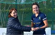 13 April 2023; Captain Hannah McLoughlin is presented with her winners medal by Vice President of Hockey Ireland Barbara O'Malley during the UCD Ladies Hockey EYHL medal presentation event at UCD Hockey Stadium in Belfield, Dublin. Photo by Tyler Miller/Sportsfile